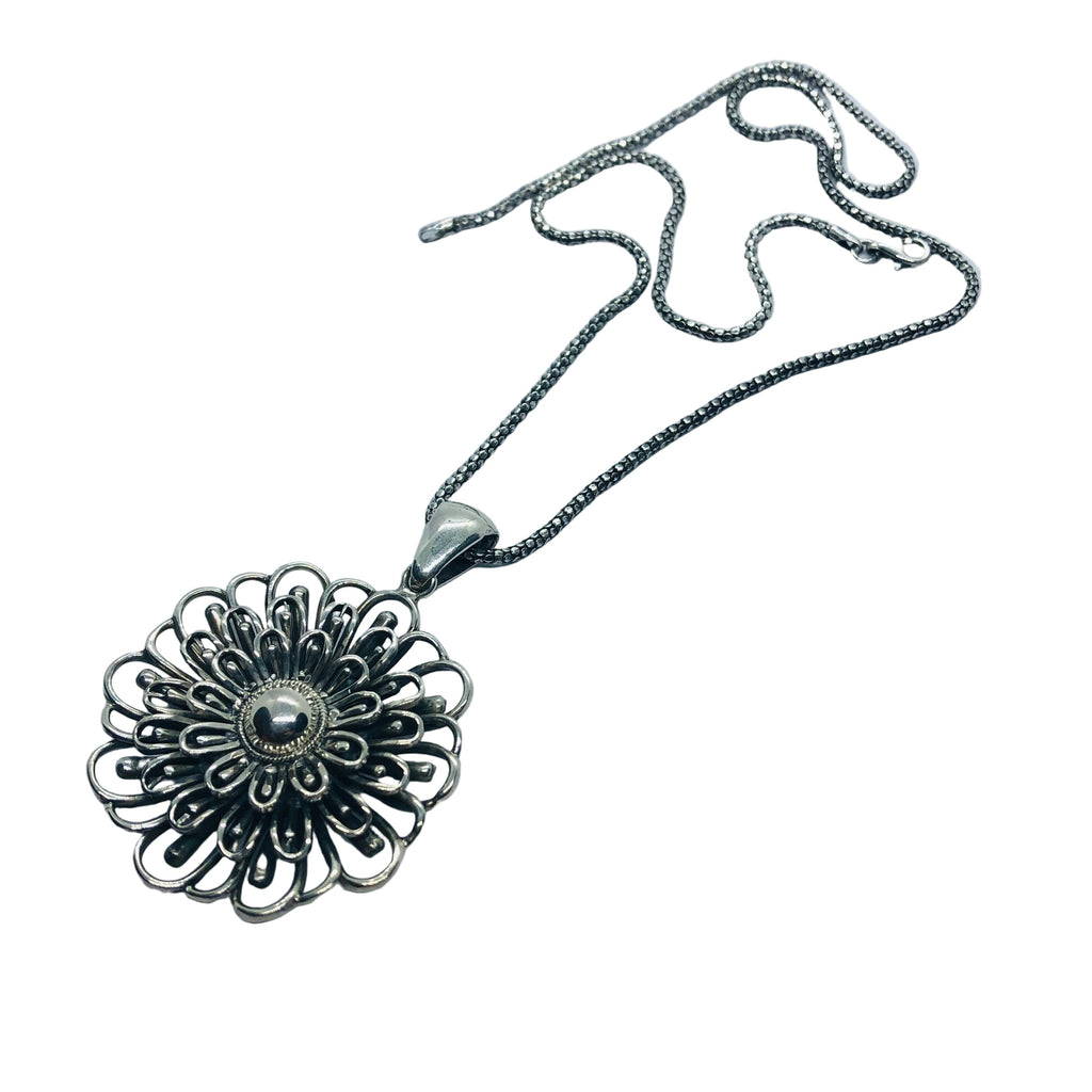 Colgante Flor Espiral de Plata 950 | Edición Única