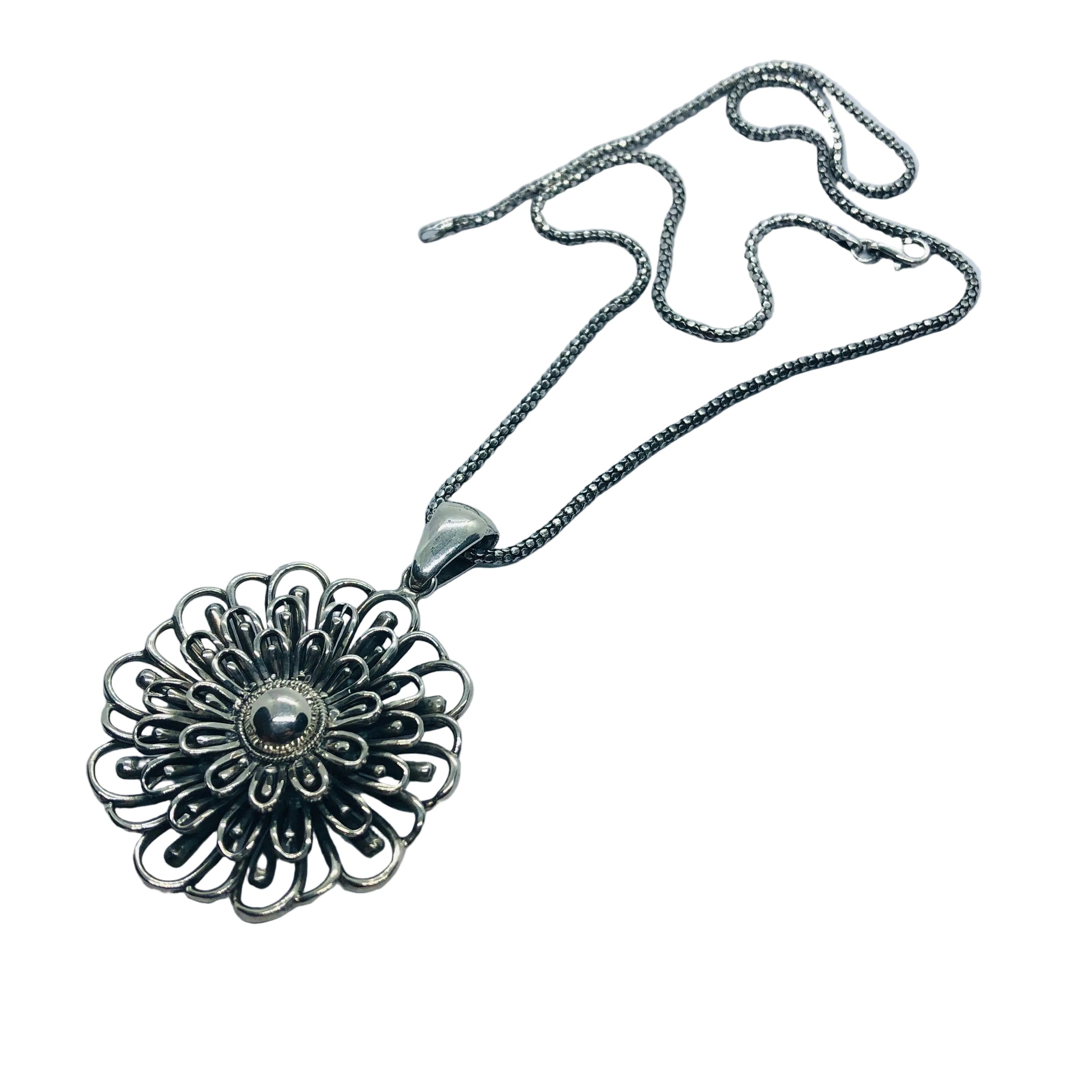 Colgante Flor Espiral de Plata 950 | Edición Única