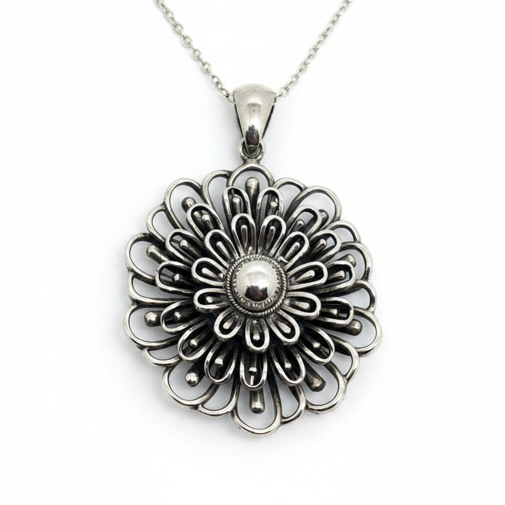 Colgante Flor Espiral de Plata 950 | Edición Única